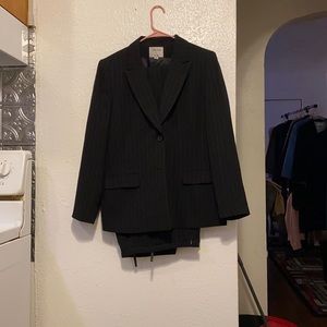 Black striped pant suit.